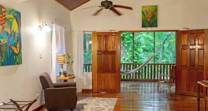 Honeymoon jungle cottage w/King bed, AC, Restaurant & car rental available.