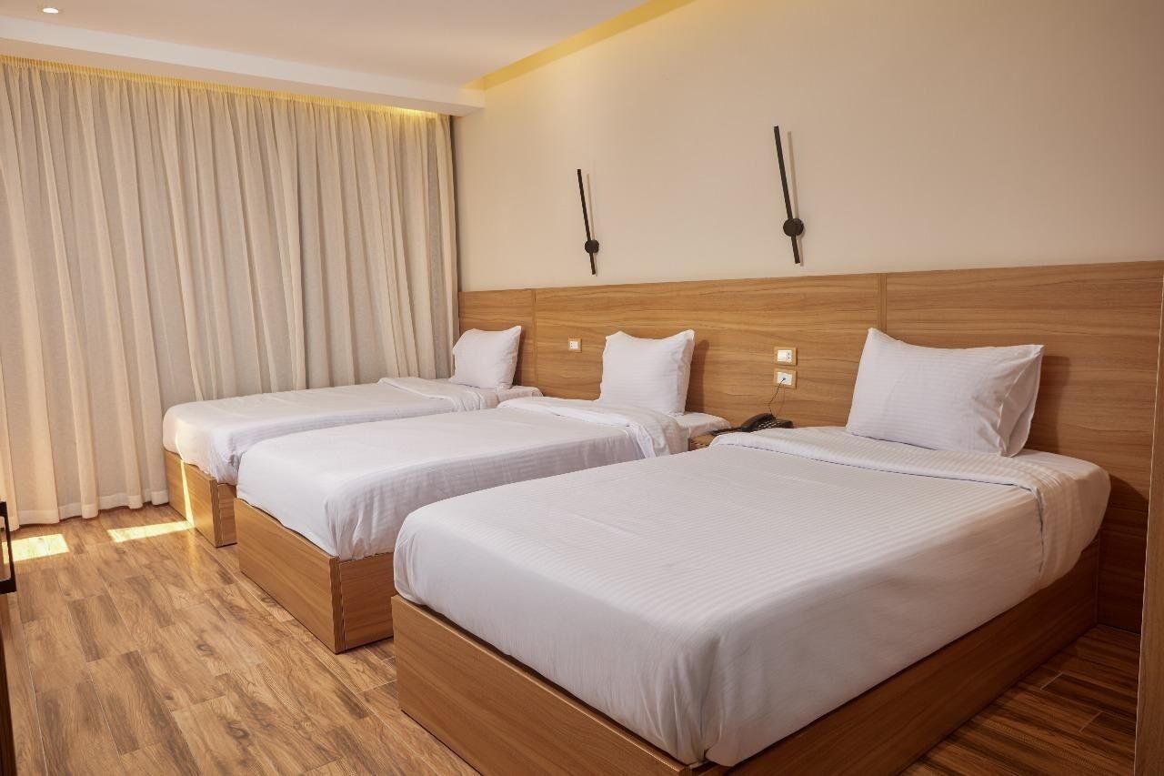 Triple Room | Blackout drapes, free WiFi