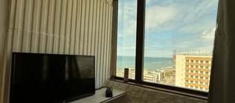 Contemplate the sunset inside the apartment 