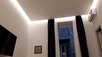 Deluxe Apartment, Balcony, Courtyard View | Egyptian cotton sheets, premium bedding, down comforters