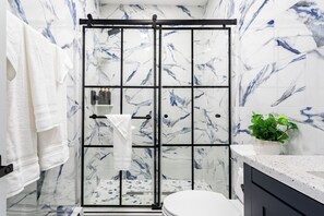 Shower, hair dryer, towels, soap