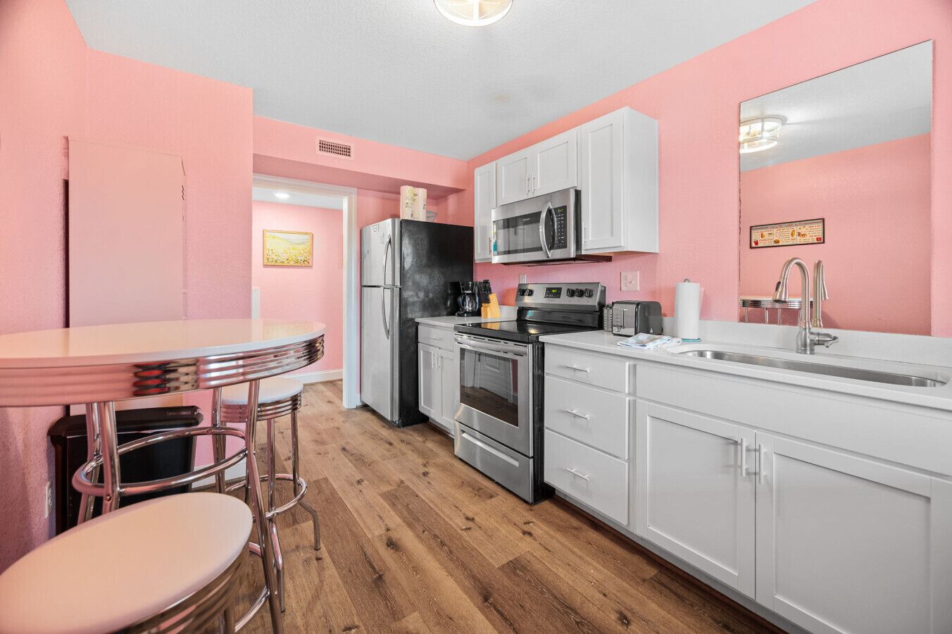 Coffee/tea maker, fridge, microwave, oven