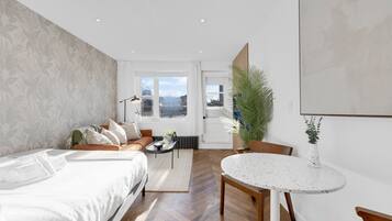 1 bedroom, desk, iron/ironing board, travel cot