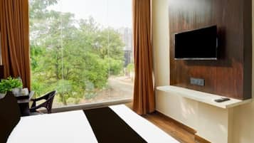 Premium bedding, memory-foam beds, laptop workspace, bed sheets