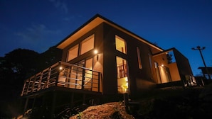 A modern two-story house with a balcony and large windows. - Nokonoshima Island Park Villa Sakimori (Fukuoka)