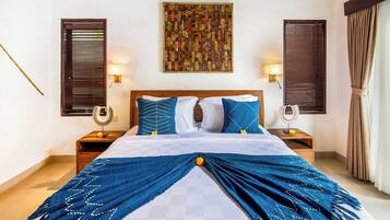 Deluxe Suite, 2 Bedrooms, Pool View | 2 bedrooms, in-room safe, iron/ironing board, free WiFi