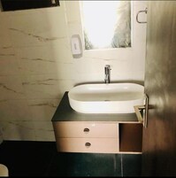 Shower, free toiletries, slippers, towels