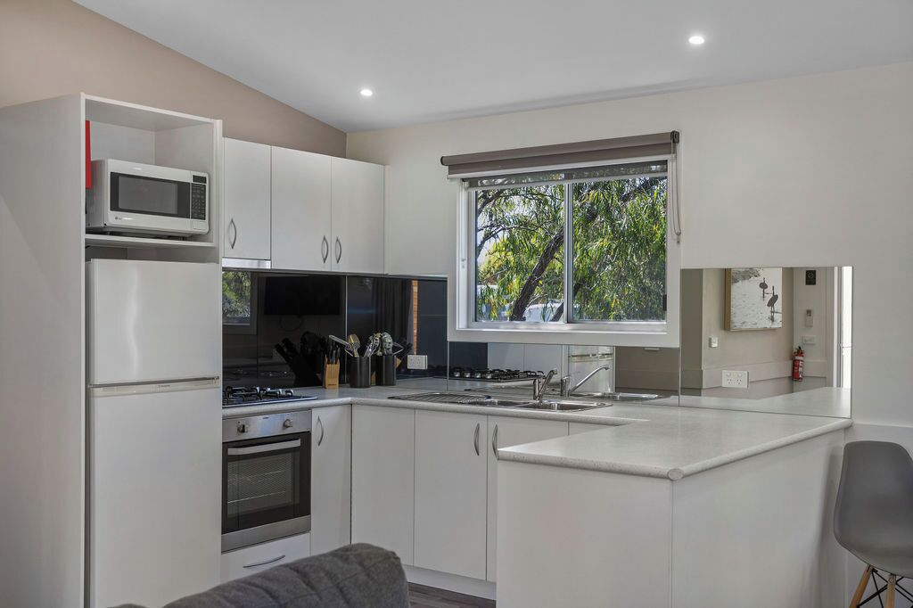 Family Triple Room | Private kitchen | Electric kettle, highchair