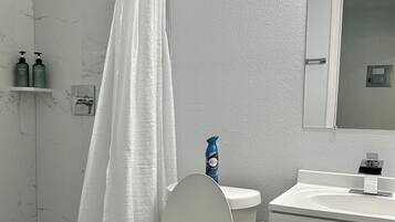 Hair dryer, towels, soap, toilet paper