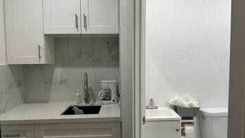 Hair dryer, towels, soap, toilet paper