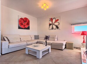 Apartment (Three Bedroom Apartment with Sea View) | Living room | 32-inch flat-screen TV with digital channels