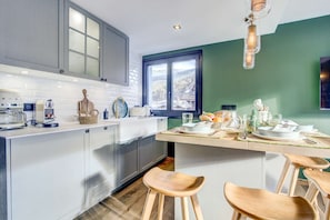 Fridge, toaster, cookware/dishes/utensils