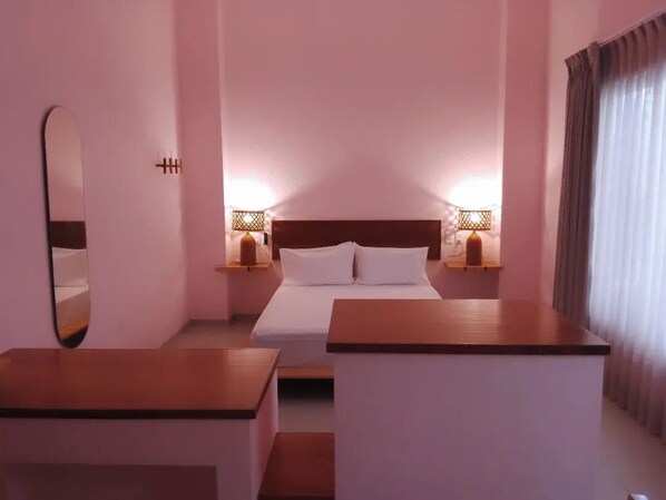 Suite Confort | 1 chambre, lit avec matelas en mousse à mémoire, minibar, coffre-fort