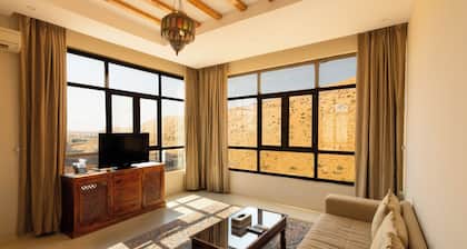 Immerse in ultimate desert elegance with the Sand Suite at Thousand Nights Camp