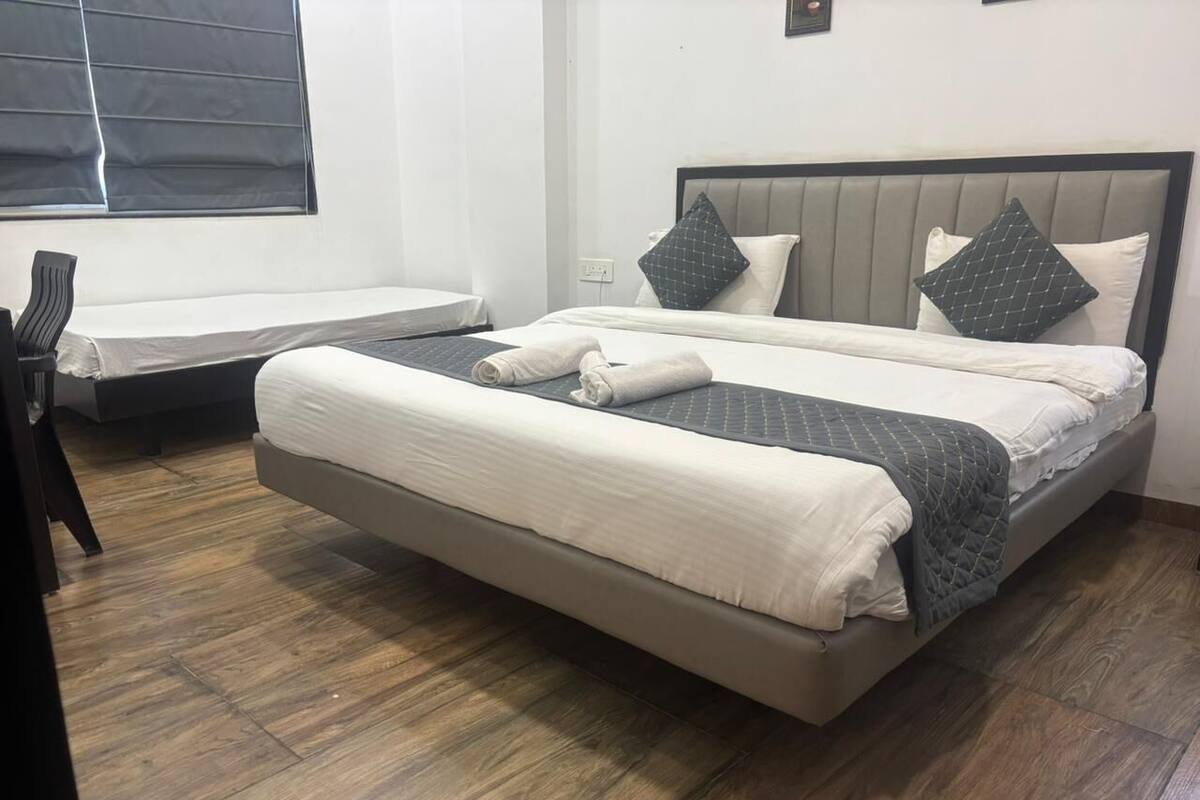 Habitación triple superior | Wifi gratis y ropa de cama