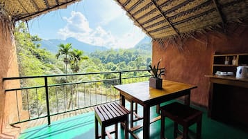 Deluxe Room, Garden View | Terrace/patio