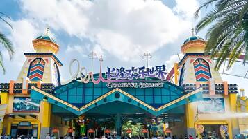 The entrance to Chittagong Paradise with a colorful facade and two towers.