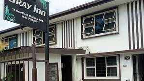 A two-story building with a sign reading "Gray Inn" at the entrance. - Gray Inn (Nadi)
