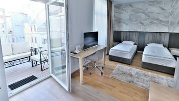 Desk, laptop workspace, blackout curtains, iron/ironing board