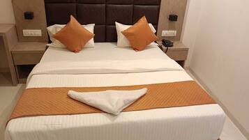 Ducha, artículos de tocador gratuitos, pantuflas, toallas