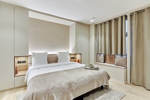 Appartement | Espace de travail pour ordinateurs portables, fer et planche à repasser