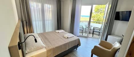 Deluxe Double Room, Balcony, Sea View | Laptop workspace, free WiFi
