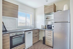 Appartamento | Cucina privata | Frigorifero, microonde, forno, piano cottura