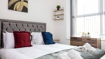 4 bedrooms, iron/ironing board, travel cot, WiFi