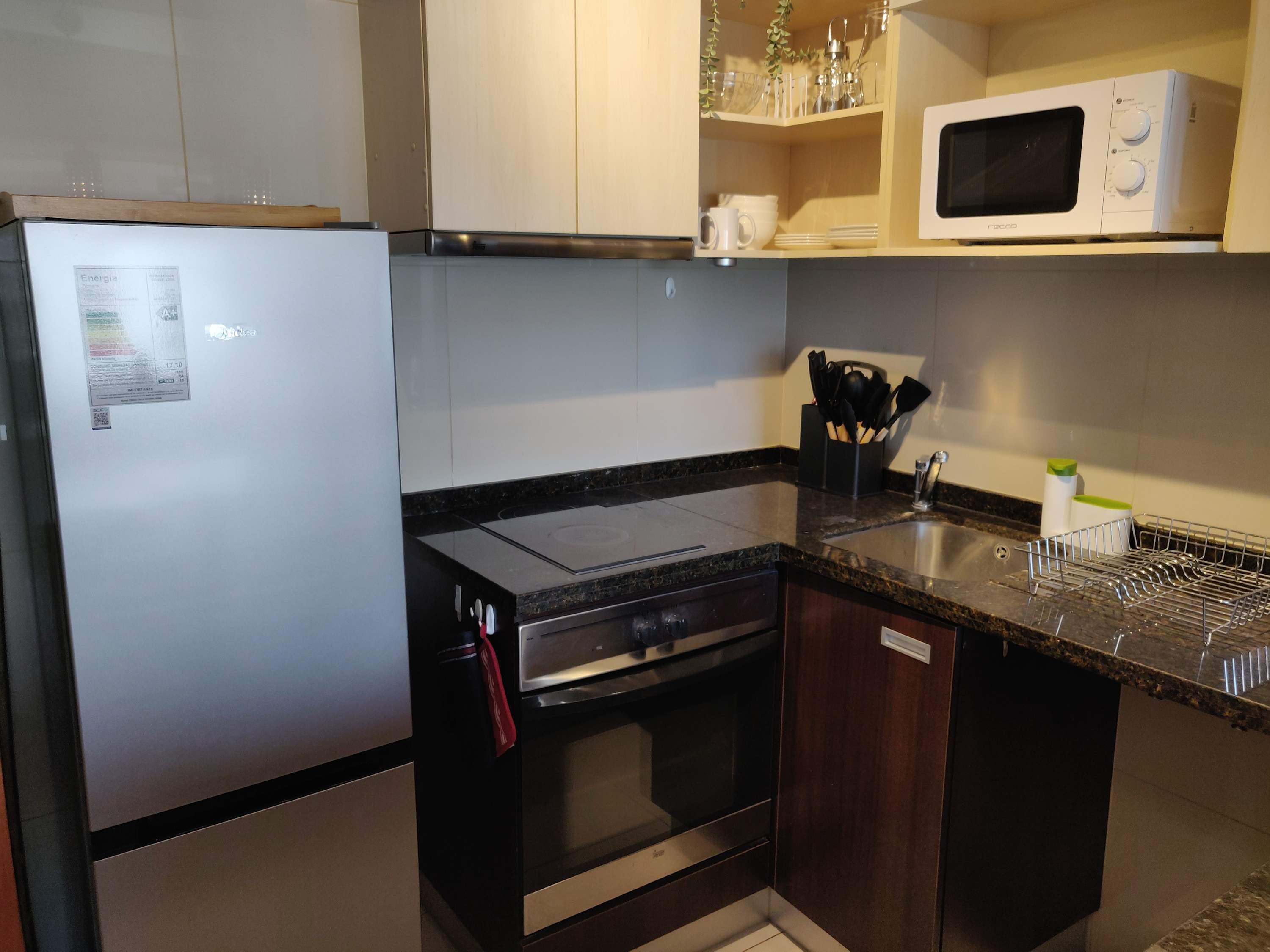 Coffee/tea maker, fridge, microwave, oven