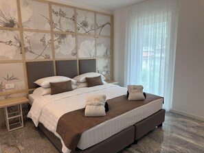 2 chambres, fer et planche à repasser, Wi-Fi, draps fournis