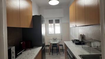 Apartment, City View | Private kitchen | Espresso maker, coffee/tea maker, electric kettle