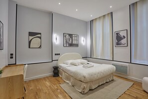 Apartment | Laptop workspace, iron/ironing board, bed sheets