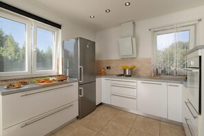 Family House, Multiple Bedrooms (Pool House Kristina) | Private kitchen | Fridge, microwave, oven, stovetop -  Pool House Kristina (Sveta Nedelja)
