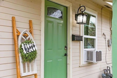 Exterior detail. Granny’s House-A Groovy Getaway with Poker Shed! Walk to Walker Disc Golf Park!