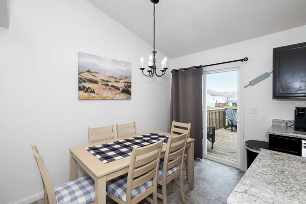 Gather for meals together at the dining table, offering seating for 6
