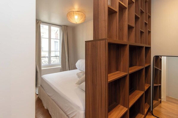 Apartment | Laptop workspace, iron/ironing board, bed sheets