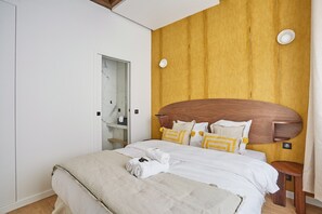 Apartment | Laptop workspace, iron/ironing board, bed sheets