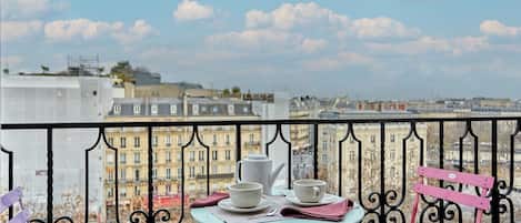 Apartamento | Restaurante al aire libre
