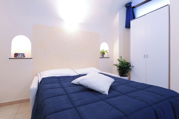 1 slaapkamer, een strijkplank/strijkijzer, wifi, beddengoed