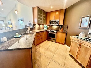 Fridge, microwave, oven, stovetop - Escape! Resort Style Condo w/Pool Near Beach (St. Petersburg)