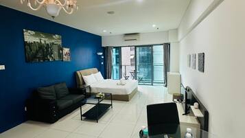 Quarto luxo | Área de estar | TV 42 polegadas com canais a cabo