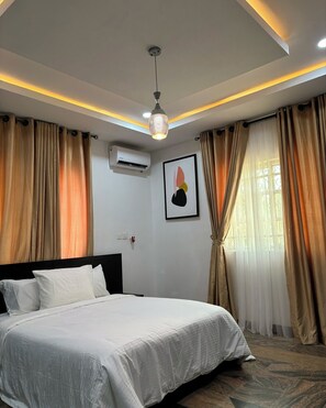 Economy Apartment, Balcony, City View | 2 bedrooms, in-room safe, desk, laptop workspace - Cactus Apartment (Abuja)