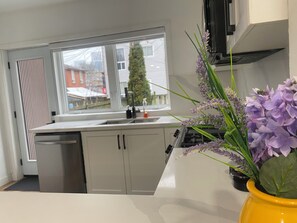 Departamento clásico, vista al jardín | Cocina privada