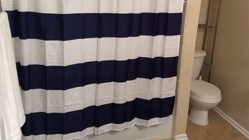 Hair dryer, towels, soap, toilet paper