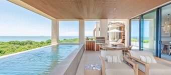 Rooftop Oasis in El Surf by Mita Residential. Private Oceanview Rooftop, Pools & Jacuzzi