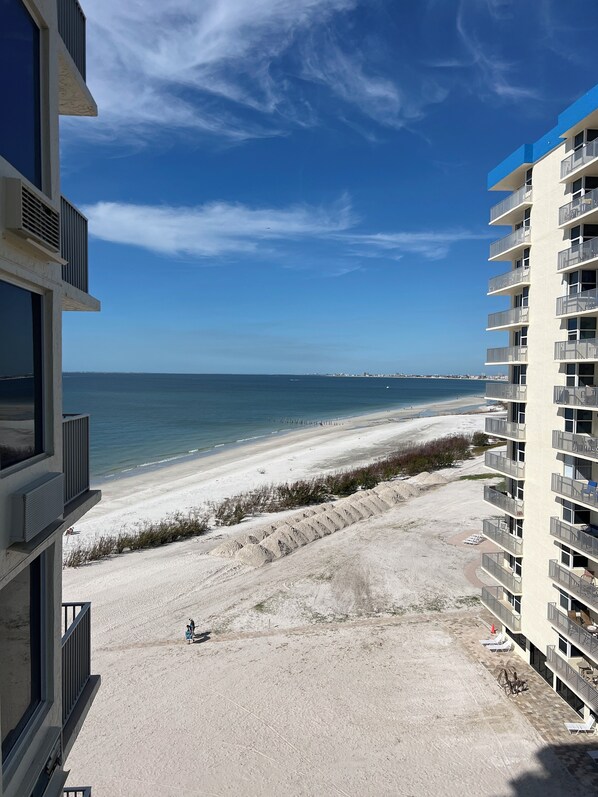 On the beach, sun loungers, beach towels