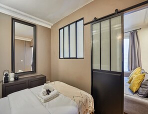 Relax in comfort with a large bed, a spacious balcony, and a modern design.