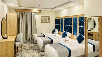 Appartement Familial, 3 chambres, non-fumeurs, vue cour intérieure | Couette en duvet d'oie, minibar, coffres-forts dans les chambres