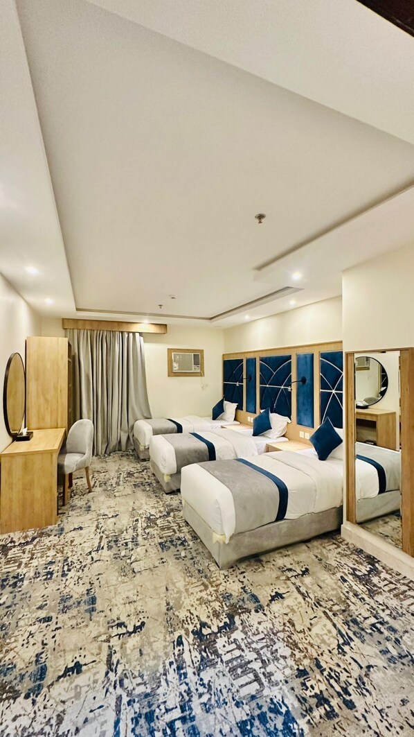 Family Apartment, 3 Bedrooms, Non Smoking, Courtyard View | Down duvets, minibar, in-room safe, blackout curtains - Alyamama Almumayz Hotel Apartments Yanbu (Yanbu)