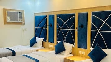 Quarto triplo standard | 2 quartos, edredons de pluma, frigobar, cofres nos quartos